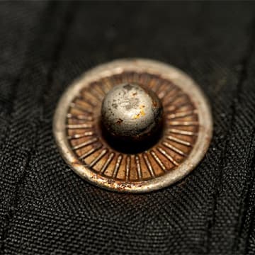 Iron Rust vs. Copper Discoloration: Why Do Snap Buttons Turn Red?